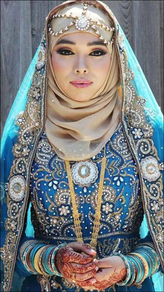 15 Inspirasi Gaun Pernikahan Syar'i Simple tapi Elegan 20