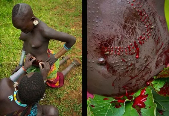 Tradisi Menyayat Wajah Suku Dinka di Sudan. Sebuah Bukti Bahwa Kecantikan Memang Relatif Sih ya... 7