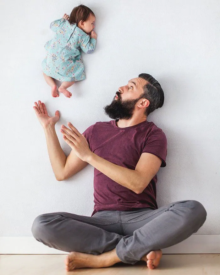 13 Foto Ini Buktikan Bahwa Cowok yang Menggendong Bayi Terlihat Lebih Tampan 16