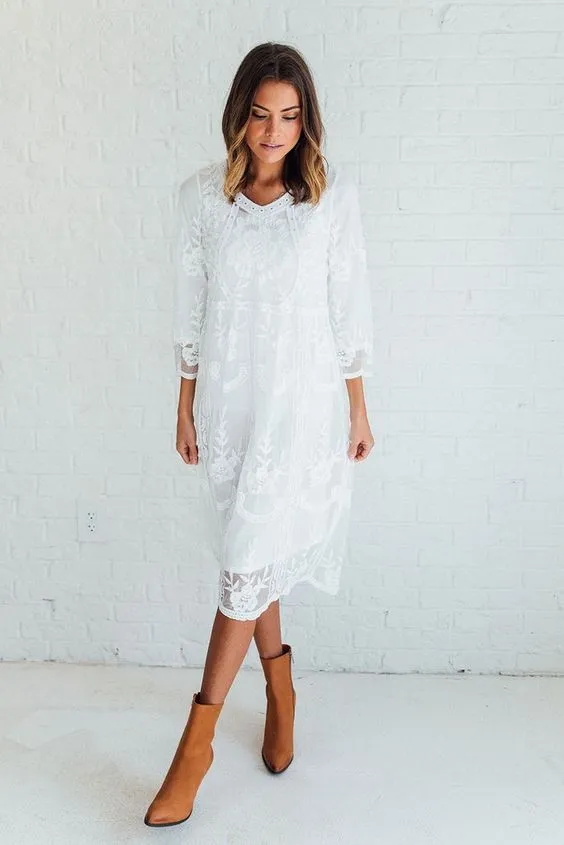 12 Inspirasi Loose Midi Dress untuk Acara Formal. Yang Satu Ini Jaminan Tidak Membentuk Lekuk Tubuh, Lho! 16