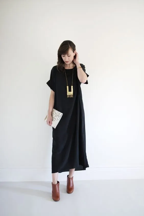 12 Inspirasi Loose Midi Dress untuk Acara Formal. Yang Satu Ini Jaminan Tidak Membentuk Lekuk Tubuh, Lho! 17