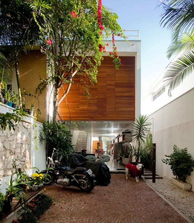 8 Desain Rumah Sempit untuk Mengakali Lahan Minim dengan Cerdik 31 desain rumah sempit