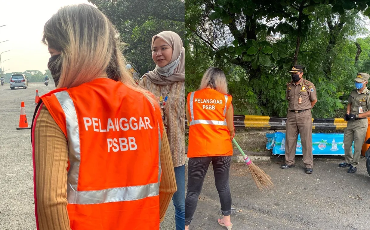 Langgar Aturan PSBB, DJ Dinar Candy Dihukum Menyapu Jalanan. Kenakan Rompi
