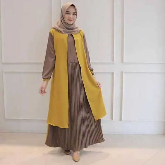 Bukan Cuma Rok Plisket, Ini Potret Gamis Plisket yang Bikin Penampilan Makin Santun 16