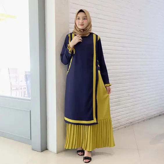 Bukan Cuma Rok Plisket, Ini Potret Gamis Plisket yang Bikin Penampilan Makin Santun 13
