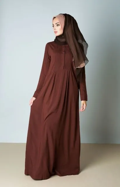Selain Hitam, Ada 8 Gamis Bernuansa Cokelat yang Nggak Kalah Netral. Wajib Coba! 13