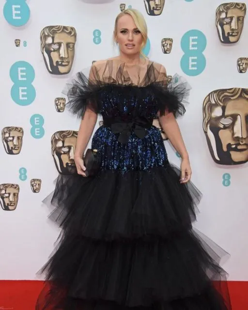 11 Potret Busana Selebritas di Red Carpet BAFTA. Anggun dan Mewah! 15 Potret seleb di red carpet BAFTA