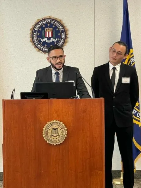 Bongkar Kasus Pemalsuan Situs, Dua Mahasiswa Unair Diundang Jadi Pembicara di Markas FBI 2 Eko Mangku Cipto dan Harianto Rantesalu di markas FBI
