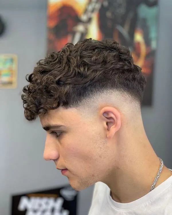Low fade curly top Credit photo via Pinterest